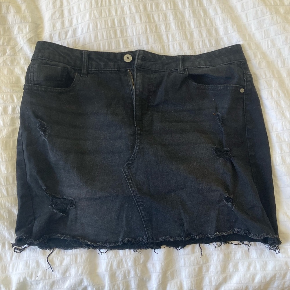 Black denim skirt with distress